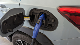 This is one of the standard plugs used by some automakers. It has a converter that can be used with standard household outlets.