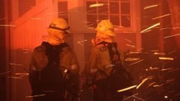 Firefighters battle the Palisades Fire in Los Angeles amid blowing embers, January 8, 2025.
