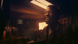 Mel Johnson Jr. as mutant cab driver Benny from Total Recall (1990), shouting his infamous line, "I'm comin' for you, baby!"